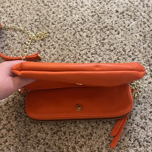 Orange fold over crossbody with gold hardware - gently used - Picture 9 of 11